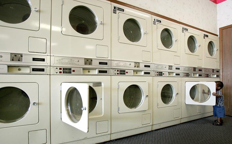 A small child faces a future in which he’ll do laundry rather than literally anything else. Photo credit: Tim Boyle/Getty